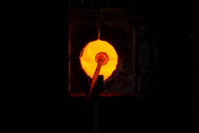 Anonymous master heating up glass in oven
