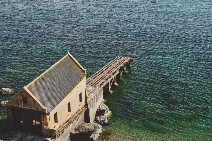 Pier with tracks for boats to mount