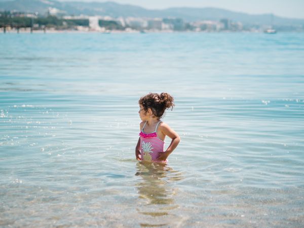 Cheerful bathing in warm sea