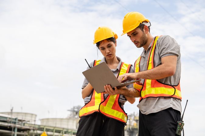Engineer worker checking project at petrochemical factory or refinery oil plant industrial.