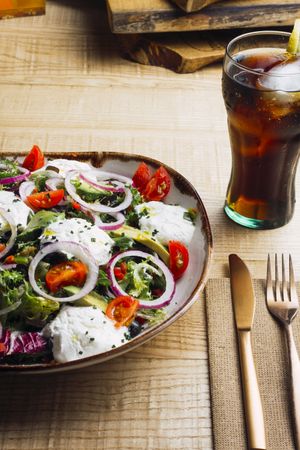 Vegetables salad with onion greens and cream sauce