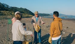 Volunteers preparing to clean the beach