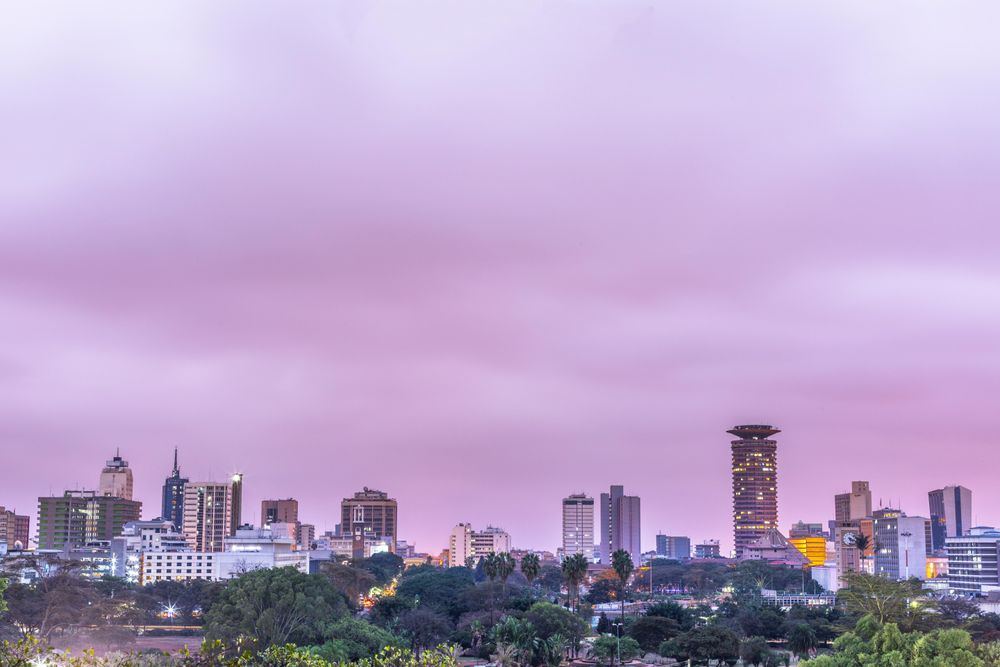 City with high rise buildings under sunset sky
