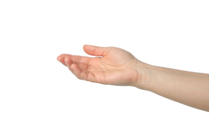 Female hand isolated on plain background. Gestures