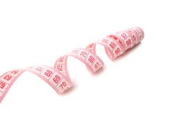 Measuring tape isolated on light background. Weight loss