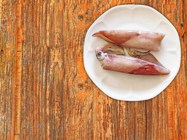 Squid On Wooden Background