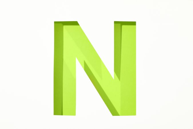 Color letter N on blank background, space for text