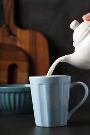Cup of coffee with creamy milk.