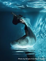 Underwater shot of woman in light dress 0vmLdb