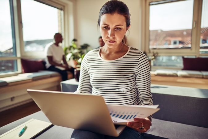 Pensive businesswoman on her laptop