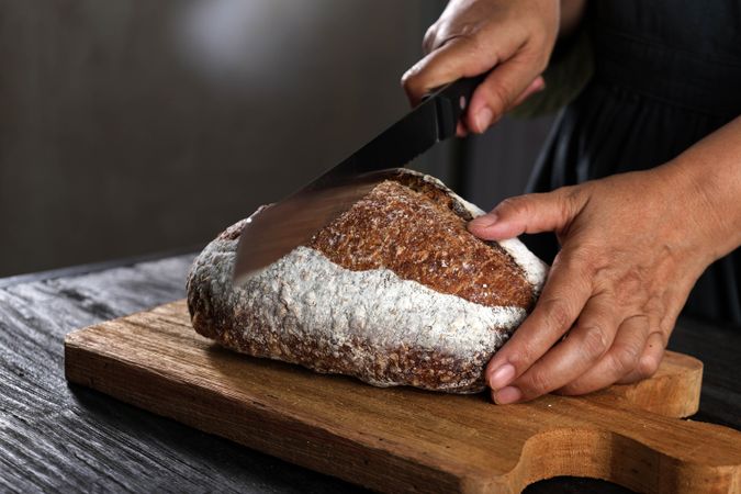 Knife Slicing Cut Sourdough Bread