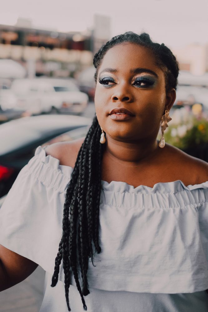 Content trendy Black woman on street