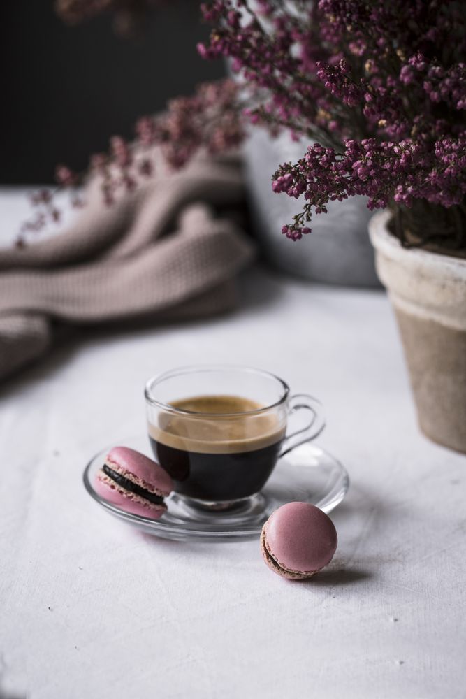 Cup of espresso with macaroons