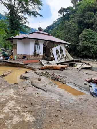 Tanah Datar, Indonesia - May 12, 2024: condition of the mosque affected by cold lava flash floods. Natural Disaster in Lembah Anai, Sepuluh Koto District, Tanah Datar, West Sumatra, Indonesia