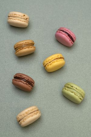Above view of colorful macaroons on a kitchen counter