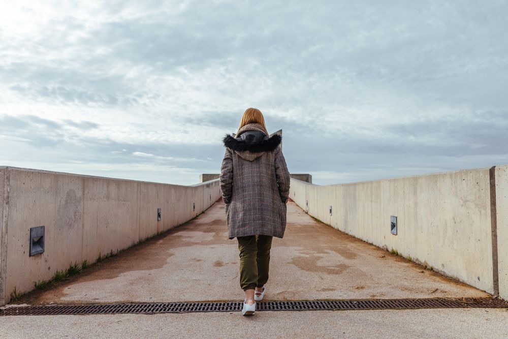 woman walking through the city