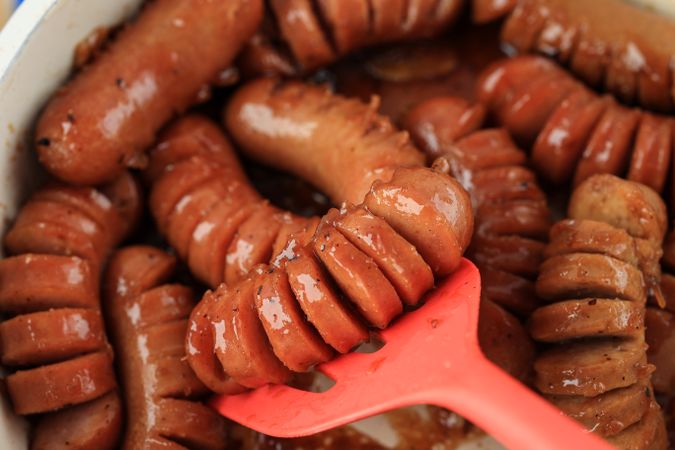 Stir Fry Sausage in Pan, Cooking Process in the Kitchen.