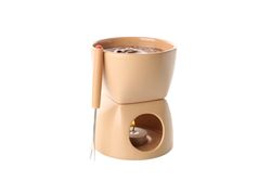 Bowl with candle for chocolate fondue isolated on plain background