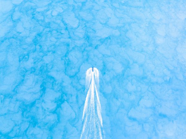 Jet sky speeding over the water.