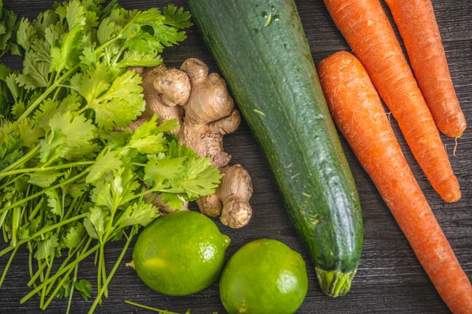 Vegetables and greens for cooking on table