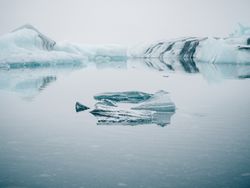 Ice on water between snow