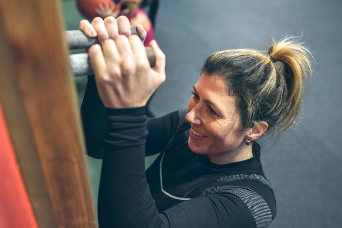 Woman hanging on the pegboard