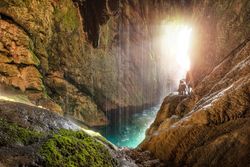 Exotic cave with mountain river
