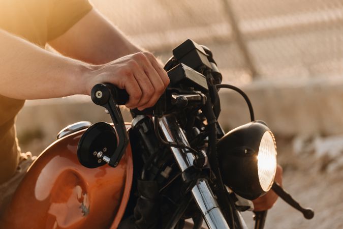 Strong man driving motorcycle