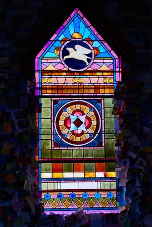 Dog-themed stained-glass window in the dog chapel, St. Johnsbury, Vermont