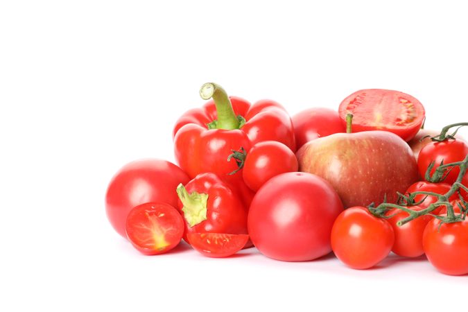 Tomatoes, apples and peppers isolated on blank background