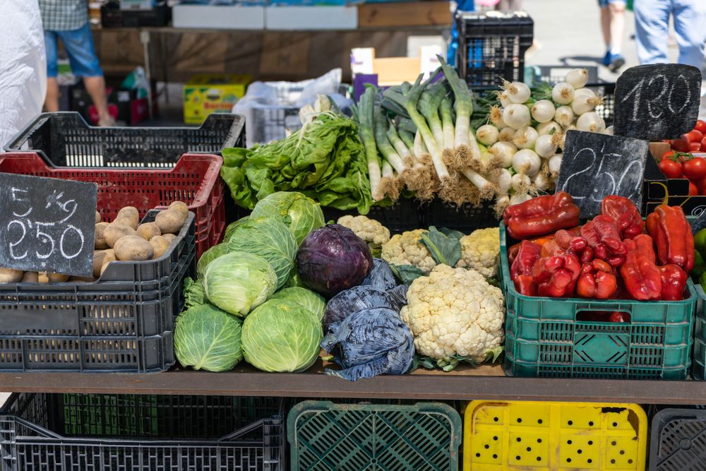 Vegetables laid out in crates to sell in market