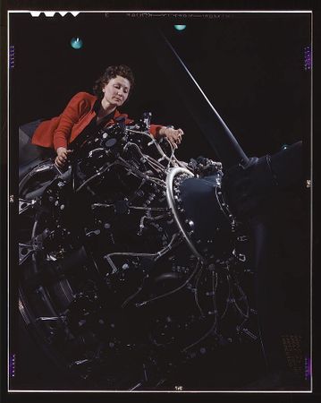 Long Beach, CA, USA - 1942: Woman at work on motor, Douglas Aircraft Company