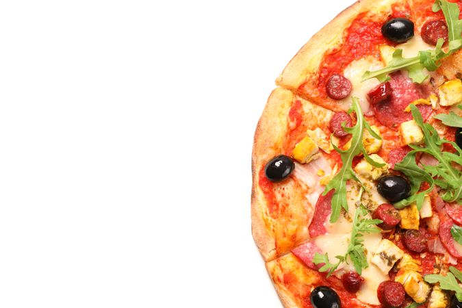 Meat pizza with arugula isolated on blank background, top view