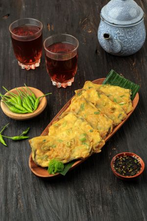 Tempeh mendoan, Indonesian sliced tempeh with yellow flour served with tea