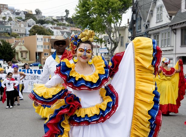 Woman in dress in Hispanic attire at Carnaval in San Francisco