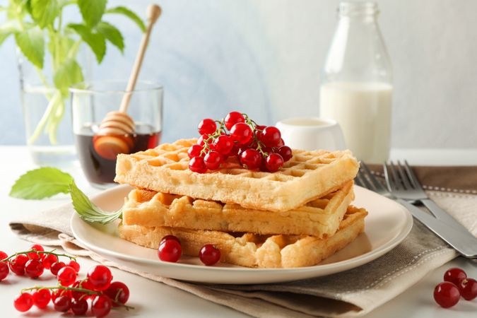 Beautiful composition with sweet belgian waffles, space for text