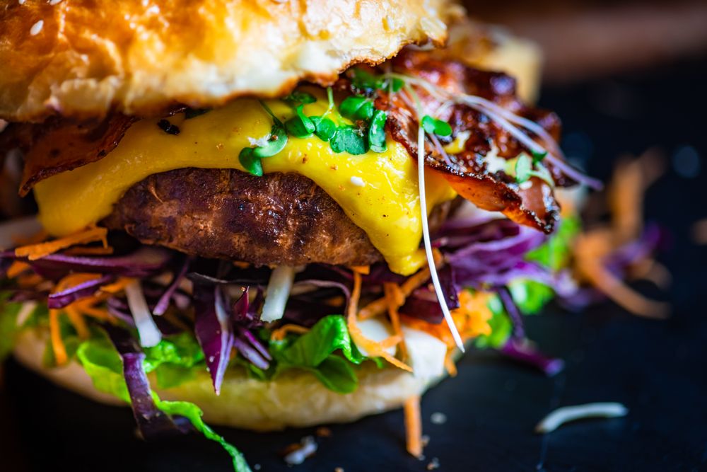 Close up of bacon cheeseburger