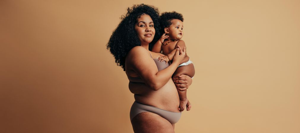 New mother comfortable with her post pregnancy body