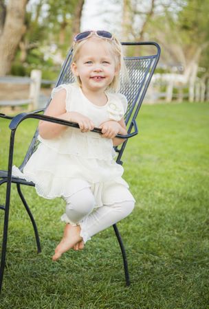 Cute Playful Baby Girl Portrait Outside at Park