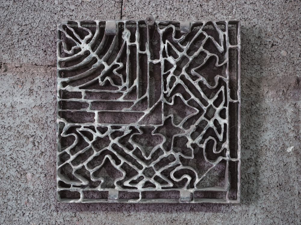 Metal mold with ornament in workshop