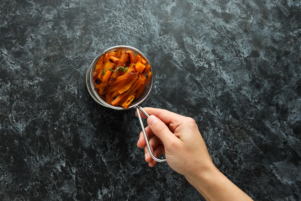 Concept of tasty food - sweet potato fries