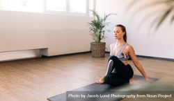 Healthy woman doing yoga indoors 432ajO