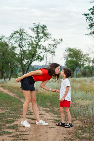 Affectionate mom with son outdoor
