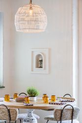 Served table with burning lamps above