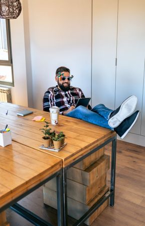 Happy office worker because he goes on vacation