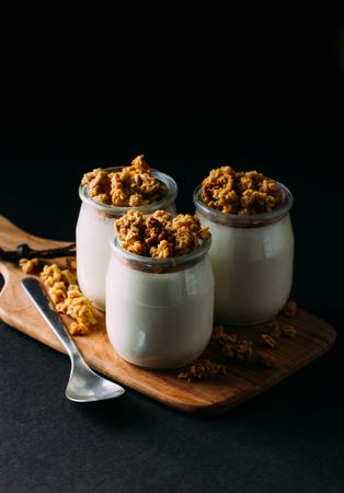 Glass bottles with milk and walnuts