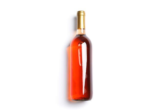 Bottle with pink wine isolated on plain background