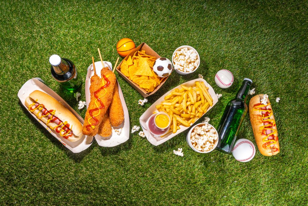 Traditional sport stadium foods and beer background