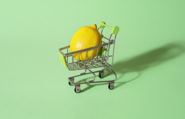 Lemon in tiny shopping cart