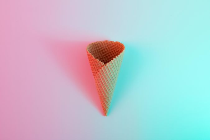 Ice cream waffle cone in vibrant bold gradient holographic colors